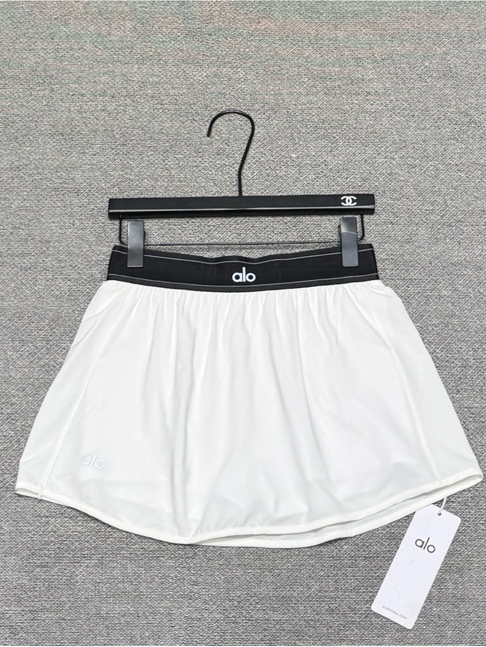 ALO Yoga White Mini Skirt with Black Elastic Waistband